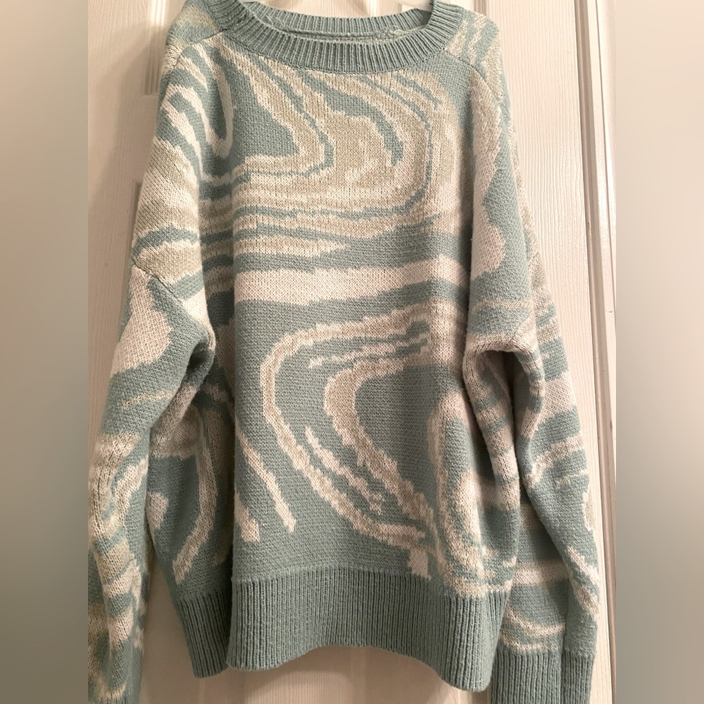 Teal green sweater
